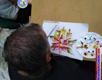 Joel Ramos en el Dia Munidal Pintor Boca y Pie